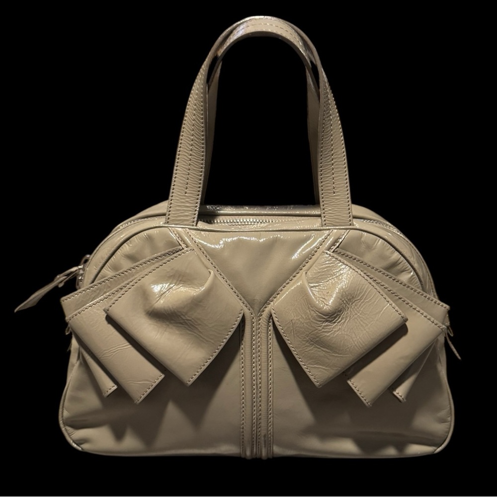 the Yves Saint Laurent Obi Bowler Bag commonly referred to the Sac Y Bow Bag